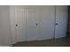 Bedroom with double and single door closets at 5031 W Flynn Ln, Glendale, AZ 85301