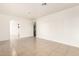 Bright dining area with tile floors and access to the kitchen at 5031 W Flynn Ln, Glendale, AZ 85301