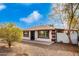 Single story home with well maintained landscaping at 5031 W Flynn Ln, Glendale, AZ 85301