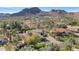 Aerial view showcasing home's design and mountain views at 5989 E Sapphire Ln, Paradise Valley, AZ 85253