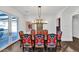 Elegant dining room with a large table and access to patio at 5989 E Sapphire Ln, Paradise Valley, AZ 85253