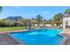 Inviting rectangular pool with brick decking offering beautiful mountain views at 5989 E Sapphire Ln, Paradise Valley, AZ 85253