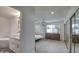 Spa-like bathroom with soaking tub and double vanity at 6017 E Beck Ln, Scottsdale, AZ 85254