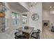 Cozy kitchen breakfast nook with a built-in bench and stylish decor at 6017 E Beck Ln, Scottsdale, AZ 85254