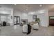 Open living area featuring hardwood floors and a fireplace at 6017 E Beck Ln, Scottsdale, AZ 85254