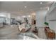 Bright and airy living room features hardwood floors and plenty of natural light at 6017 E Beck Ln, Scottsdale, AZ 85254