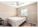 Bright bedroom with a double bed and ceiling fan at 632 N 95Th St, Mesa, AZ 85207