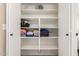 Neat linen closet with shelves for storage at 632 N 95Th St, Mesa, AZ 85207