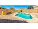 Backyard view showcasing a beautiful private pool and brick pavers at 6410 W Hughes Dr, Phoenix, AZ 85043