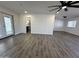 Living room featuring vinyl floors, neutral paint and plenty of natural light at 6449 E Dodge St, Mesa, AZ 85205