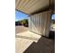 Image of a backyard storage shed featuring a metal structure and concrete base, set in a gravel landscape at 6449 E Dodge St, Mesa, AZ 85205