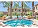 Relaxing community pool and spa with lounge chairs and patio tables at 6565 E Thomas Rd # 1015, Scottsdale, AZ 85251