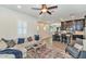 Comfortable living room with L-shaped sofa and large windows at 6565 E Thomas Rd # 1015, Scottsdale, AZ 85251