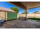 Covered patio, artificial turf, and privacy wall at 6612 W Paso Trl, Phoenix, AZ 85083