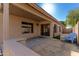 Covered patio with sitting area and access to the house at 6612 W Paso Trl, Phoenix, AZ 85083