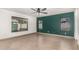 Bright bedroom with tile floors, ceiling fan, and access to bathroom at 6612 W Paso Trl, Phoenix, AZ 85083