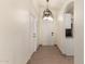 Bright entryway with tile floors and a chandelier at 6612 W Paso Trl, Phoenix, AZ 85083