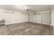 Spacious garage with concrete floor and automatic door at 6612 W Paso Trl, Phoenix, AZ 85083