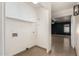 Bright laundry room with upper cabinets and tile floor at 6612 W Paso Trl, Phoenix, AZ 85083