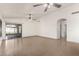 Bright living room with tile floors and sliding glass door to backyard at 6612 W Paso Trl, Phoenix, AZ 85083