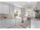 Beautiful kitchen with white cabinetry, granite countertops, and stainless steel appliances at 6811 N 11Th Ave, Phoenix, AZ 85013