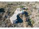 Aerial view of a circular home on a mountainside at 6836 N 36Th St, Phoenix, AZ 85018