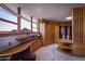 Primary bathroom features a large soaking tub, walk-in shower, and stunning copper tile at 6836 N 36Th St, Phoenix, AZ 85018