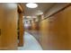 Long curved hallway with wood paneling at 6836 N 36Th St, Phoenix, AZ 85018