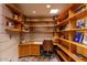 Home office with custom wooden built-ins and shelving at 6836 N 36Th St, Phoenix, AZ 85018