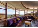 Living room with curved seating and stunning mountain views at 6836 N 36Th St, Phoenix, AZ 85018