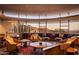 Mid-century modern living room with circular seating and mountain views at 6836 N 36Th St, Phoenix, AZ 85018