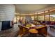 Mid-century modern living room with fireplace and mountain views at 6836 N 36Th St, Phoenix, AZ 85018