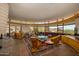 Living room with a curved seating area and panoramic views at 6836 N 36Th St, Phoenix, AZ 85018