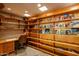 Built-in wooden shelves and desk in home office at 6836 N 36Th St, Phoenix, AZ 85018