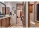 Bathroom with a toilet, shower, and vanity at 6876 S Star Dr, Gilbert, AZ 85298