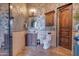 Elegant bathroom with stone tile, vanity, and toilet at 6876 S Star Dr, Gilbert, AZ 85298