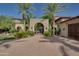 Mediterranean style home with gated entry and manicured landscaping at 6876 S Star Dr, Gilbert, AZ 85298