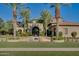 Mediterranean style home with gated entry and manicured landscaping at 6876 S Star Dr, Gilbert, AZ 85298