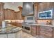 Kitchen boasts granite countertops and stainless steel appliances at 6876 S Star Dr, Gilbert, AZ 85298