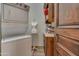 Convenient laundry room with stackable washer and dryer at 6876 S Star Dr, Gilbert, AZ 85298