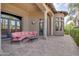 Relaxing covered patio with comfortable seating and paver stones at 6876 S Star Dr, Gilbert, AZ 85298