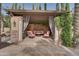 Relaxing covered patio with seating area and striped curtains at 6876 S Star Dr, Gilbert, AZ 85298