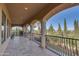 Covered patio with seating area, fireplace, and stunning views at 6876 S Star Dr, Gilbert, AZ 85298