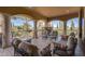 Covered patio with seating area, fireplace, and stunning views at 6876 S Star Dr, Gilbert, AZ 85298