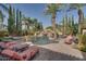 Relaxing pool area with lounge chairs and a spa at 6876 S Star Dr, Gilbert, AZ 85298