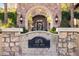An upscale neighborhood address stone marker with the home's address welcomes residents and visitors at 6876 S Star Dr, Gilbert, AZ 85298