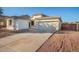 One-story house with a two-car garage and a gravel driveway at 6924 W Southgate Ave, Phoenix, AZ 85043