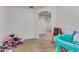 Playroom with wood-look tile floors and plenty of space for toys at 6924 W Southgate Ave, Phoenix, AZ 85043