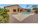 Inviting backyard oasis with a sparkling pool and patio at 7261 E Black Rock Rd, Scottsdale, AZ 85255