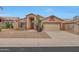 Single-story home with desert landscaping and two-car garage at 7261 E Black Rock Rd, Scottsdale, AZ 85255